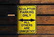 a yellow parking only sign hanging on a wooden wall
