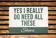 a sign that says, yes i really do need all these shoes