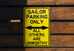 a yellow sign that says sailor parking only all others are unworthyly