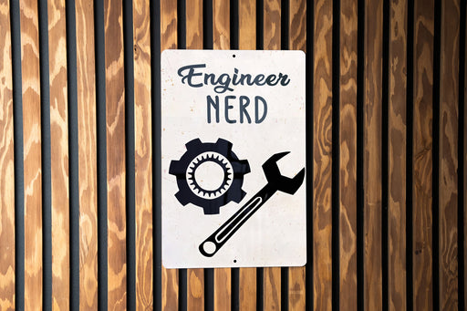 a sign on a wooden wall that says engineer nerd