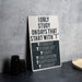 a sign that is sitting on a table