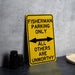 a yellow sign that says fisherman parking only all others are unworthyly