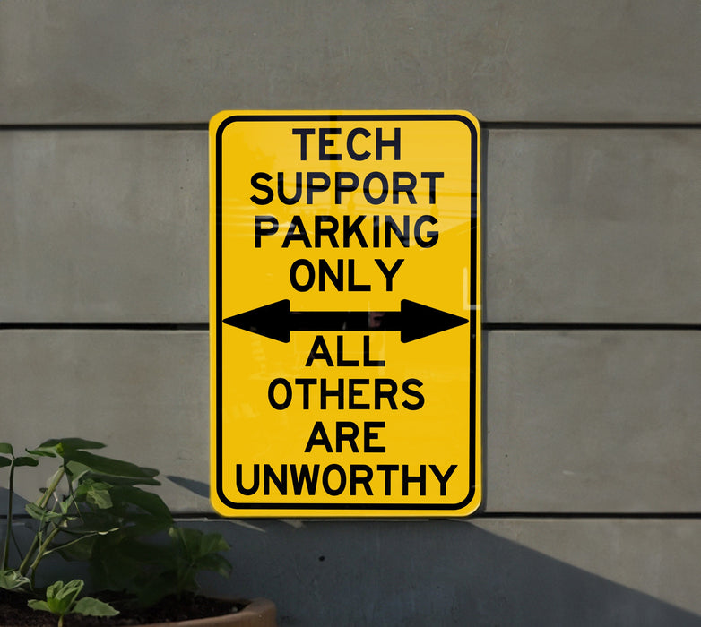 a yellow sign that says tech support parking only all others are unworthyly