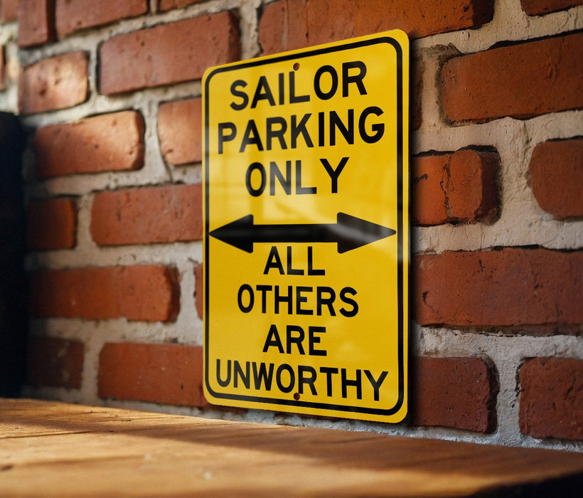 a yellow sign that says sailor parking only all others are unworthyly