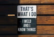 a sign on a wooden wall that says, that's what i do i