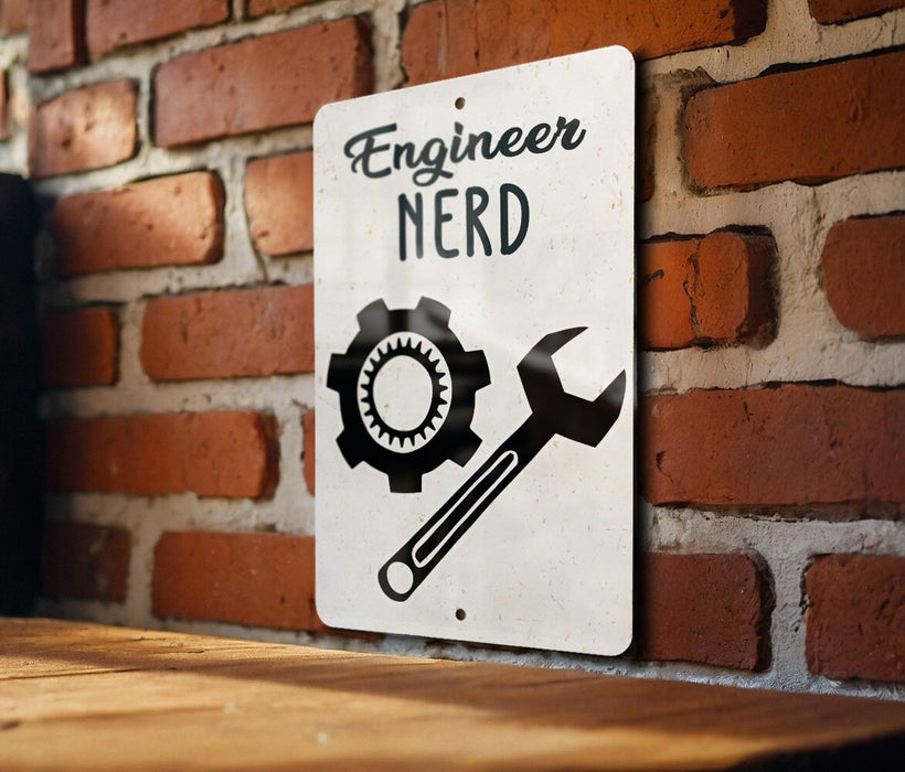 a sign on a brick wall that says engineer nerd