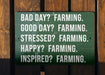 a green sign that says bad day? farming good day? farming stress? farming