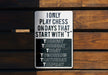 a sign on a wooden wall that says i only play chess on days that start
