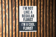 a sign on a wooden wall that says i'm not like a regular fl
