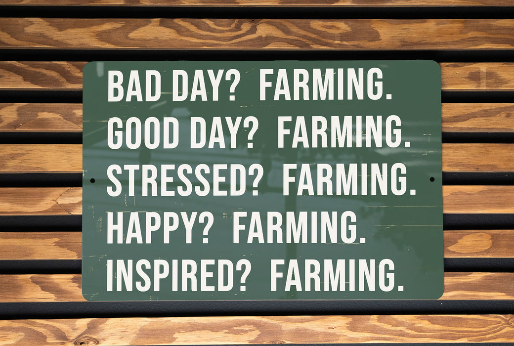 a sign on a wooden bench that says, bad day? farming good day?