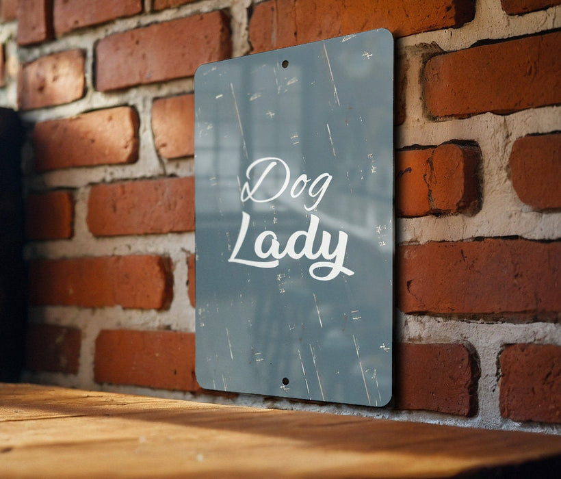 a sign that reads dog lady on a brick wall