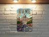 a white brick wall with a picture of a building on it