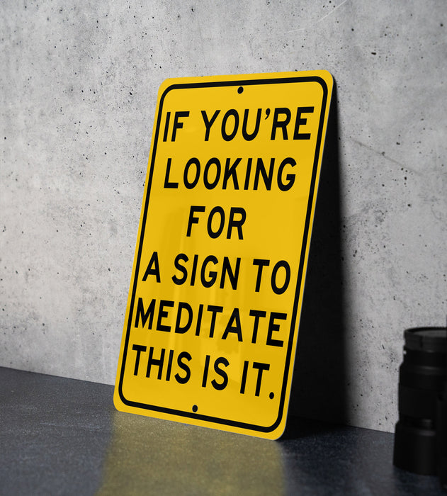 a yellow sign that says if you're looking for a sign to meditate