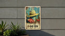 a picture of a person wearing a hat on a sign