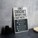a black and white sign sitting on top of a table
