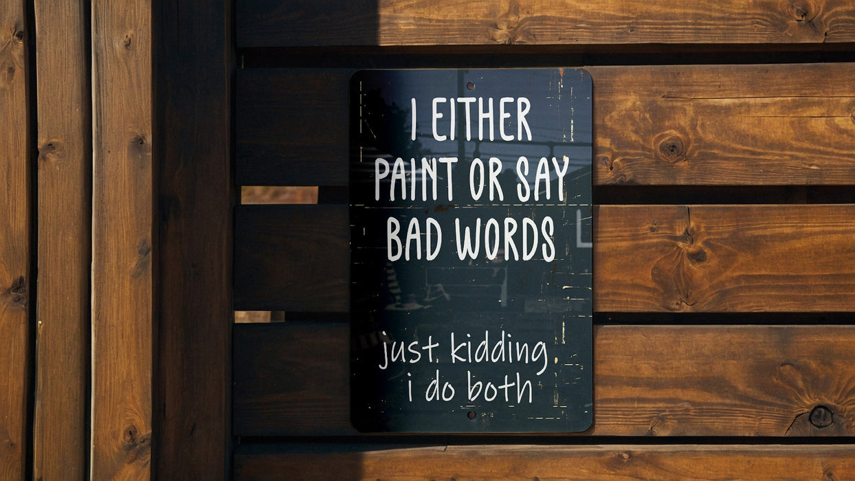 a sign on a wooden fence that says i either paint or say bad words