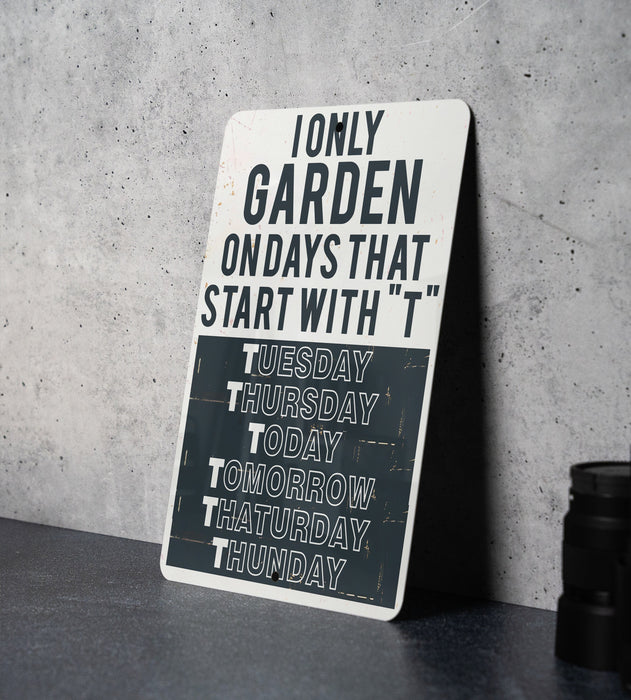 a sign on a table that says only garden on days that start with t