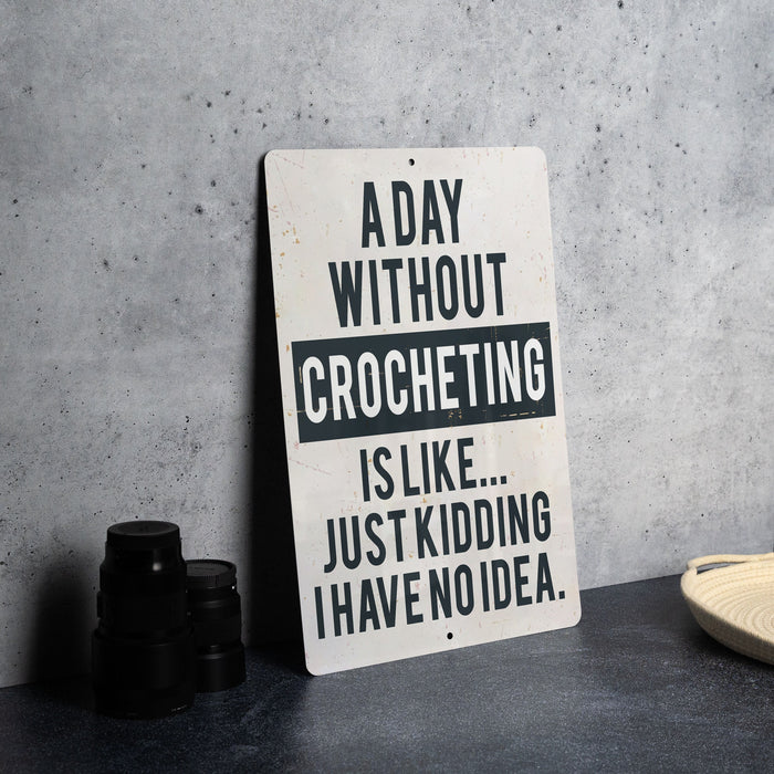 a sign that says a day without crocheting is like just kidding have
