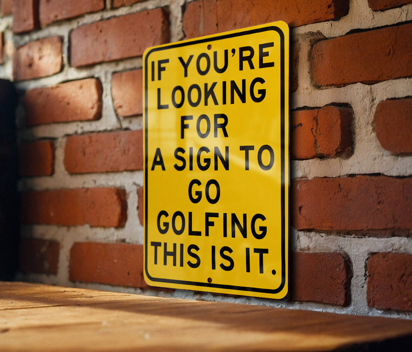 a yellow sign that says if you're looking for a sign to go golf