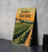 a picture of a wine cellar sign on a table