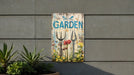 a garden sign on the side of a building