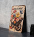 a wooden sign with flowers painted on it