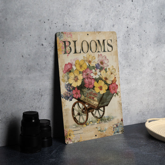 a picture of a wheelbarrow with flowers on it