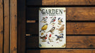 a sign on a wooden fence with birds on it