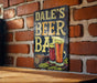 a sign on a brick wall that says dale's beer bar