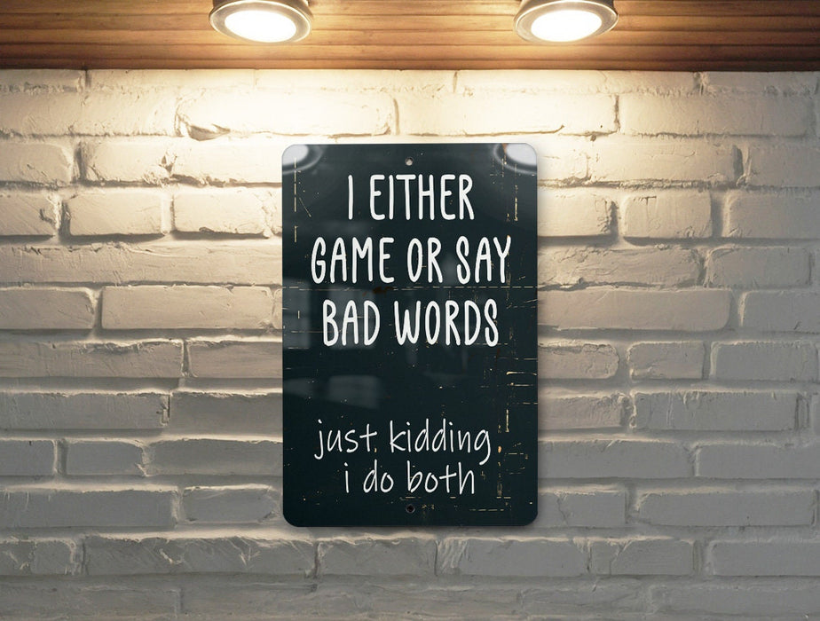 a sign that says i either game or say bad words just kidding i do