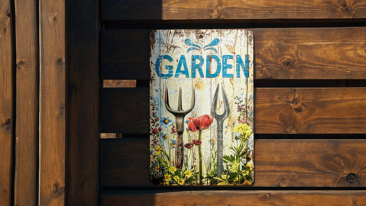 a garden sign hanging on a wooden fence