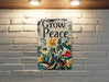 a sign on a brick wall that says grow peace