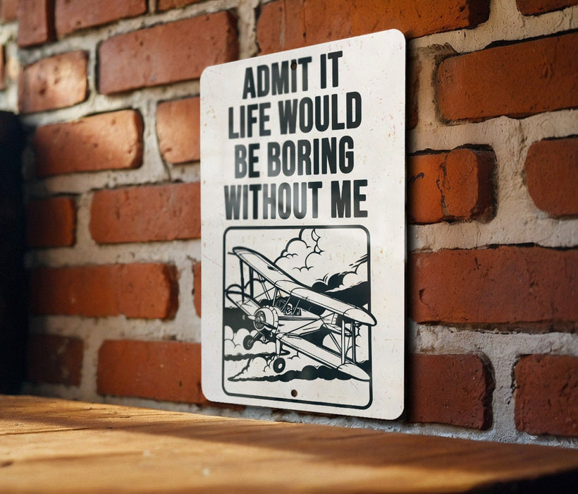a sign on a brick wall that says admit it life would be boring without me
