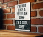 a sign on a brick wall that says i'm not like a regular chef
