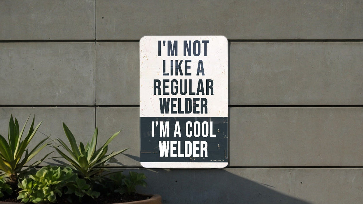 a sign on a wall that says i'm not like a regular welder