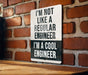 a sign on a brick wall that says i'm not like a regular engineer
