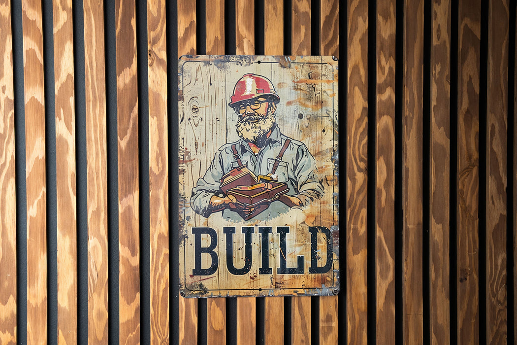 a sign on the side of a building that says build