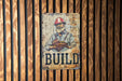 a sign on the side of a building that says build