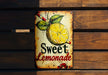 a sign that says sweet lemonade on it