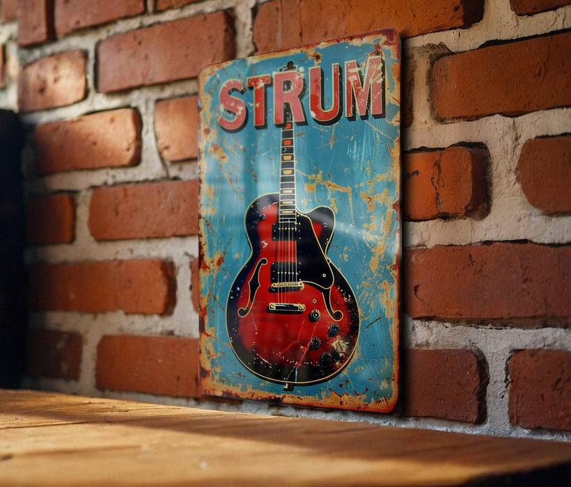 a red electric guitar on a blue sign on a brick wall