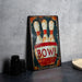 a metal sign with a bowling pin on it