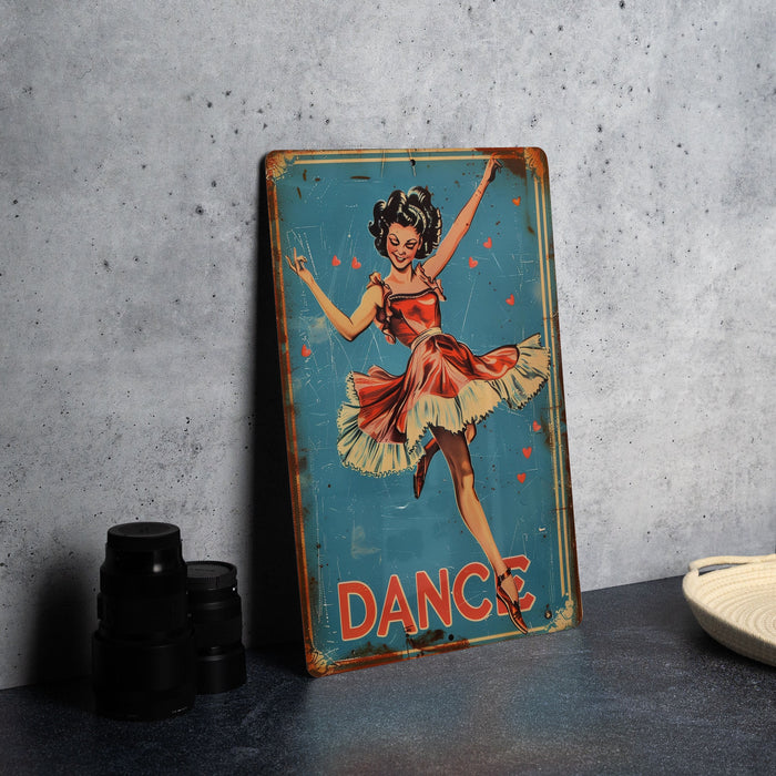 a tin sign with a woman dancing on it
