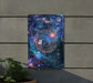 a picture of a solar system hanging on a wall