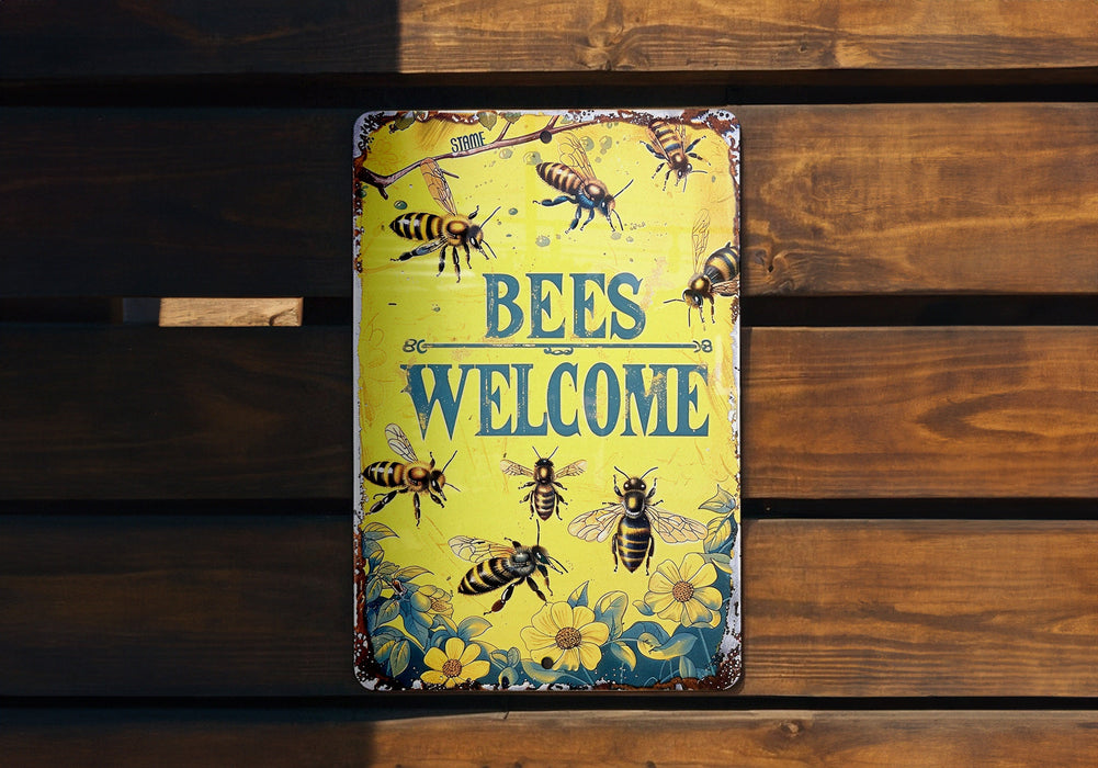 a sign that says bees welcome on a wooden bench