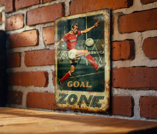 a picture of a man kicking a soccer ball on a brick wall