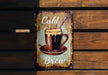 a sign on a wooden wall that says cold brew