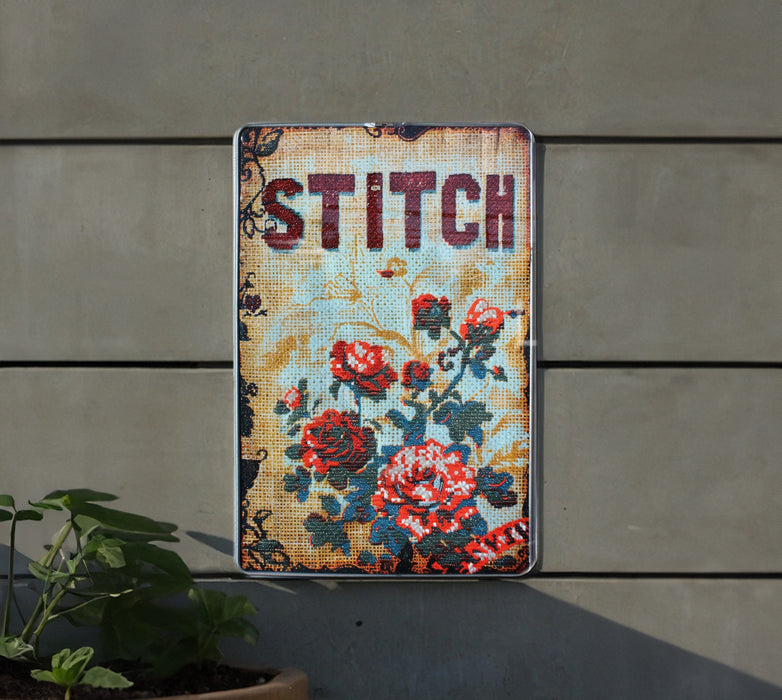 a sign on a wall that says stitch