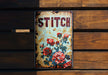 a sign that says stitch on a wooden wall