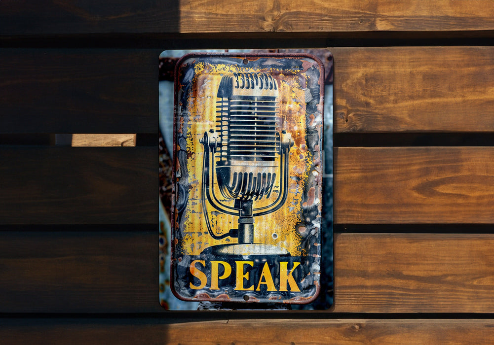 a metal sign with a microphone on it