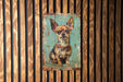 a painting of a dog on a wooden wall